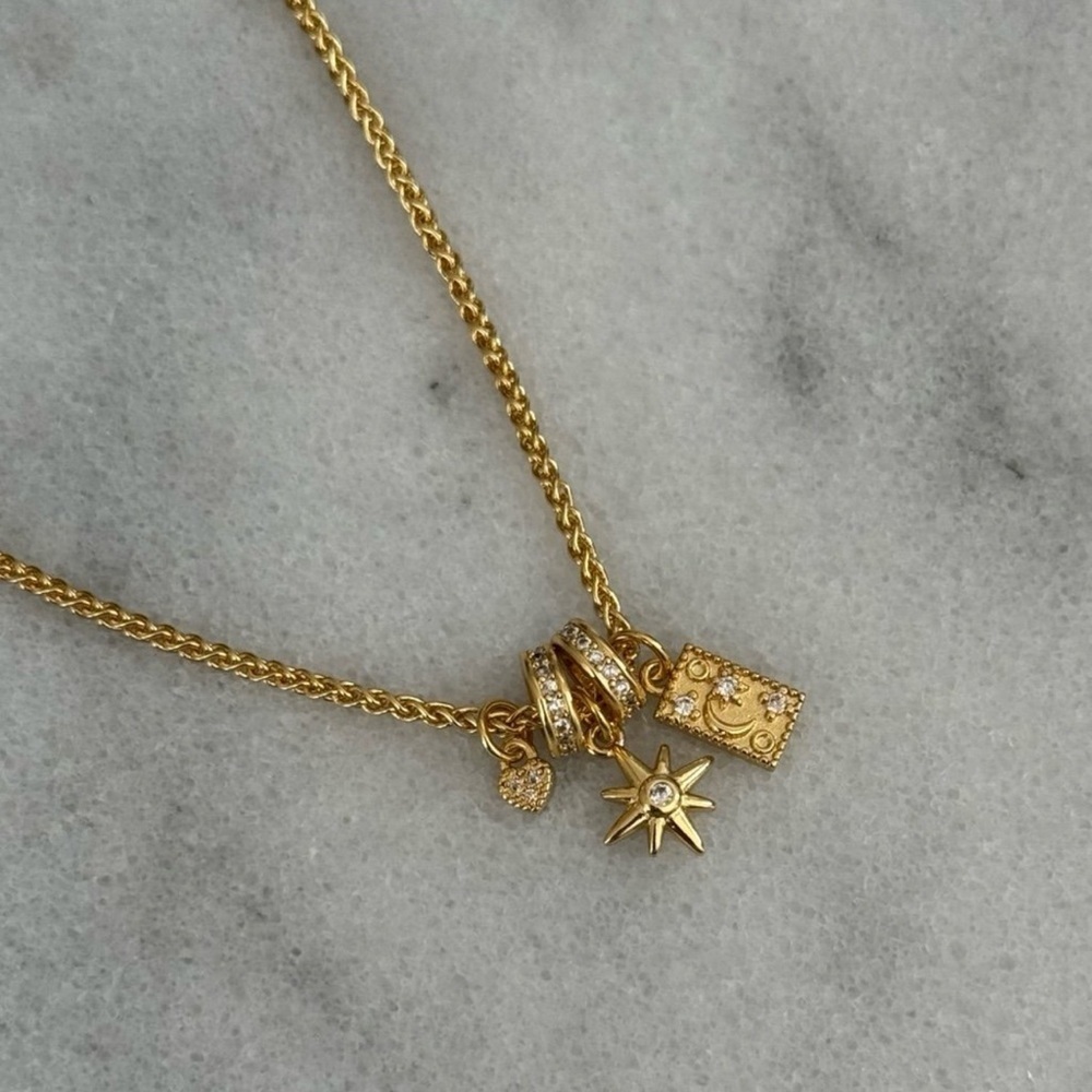 NEW STOCK Gold Star Burst Crystal Moon Charm Necklace 

Brand New